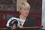  Senator Murray holds up the report she requested from the Inspector General at the Department of Housing and Urban Development.